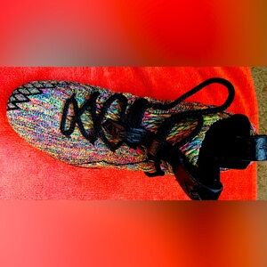 Men’s size 6.5 Nike multicolor shoes.